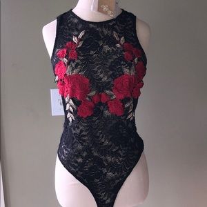 Black lace with floral embroidered design